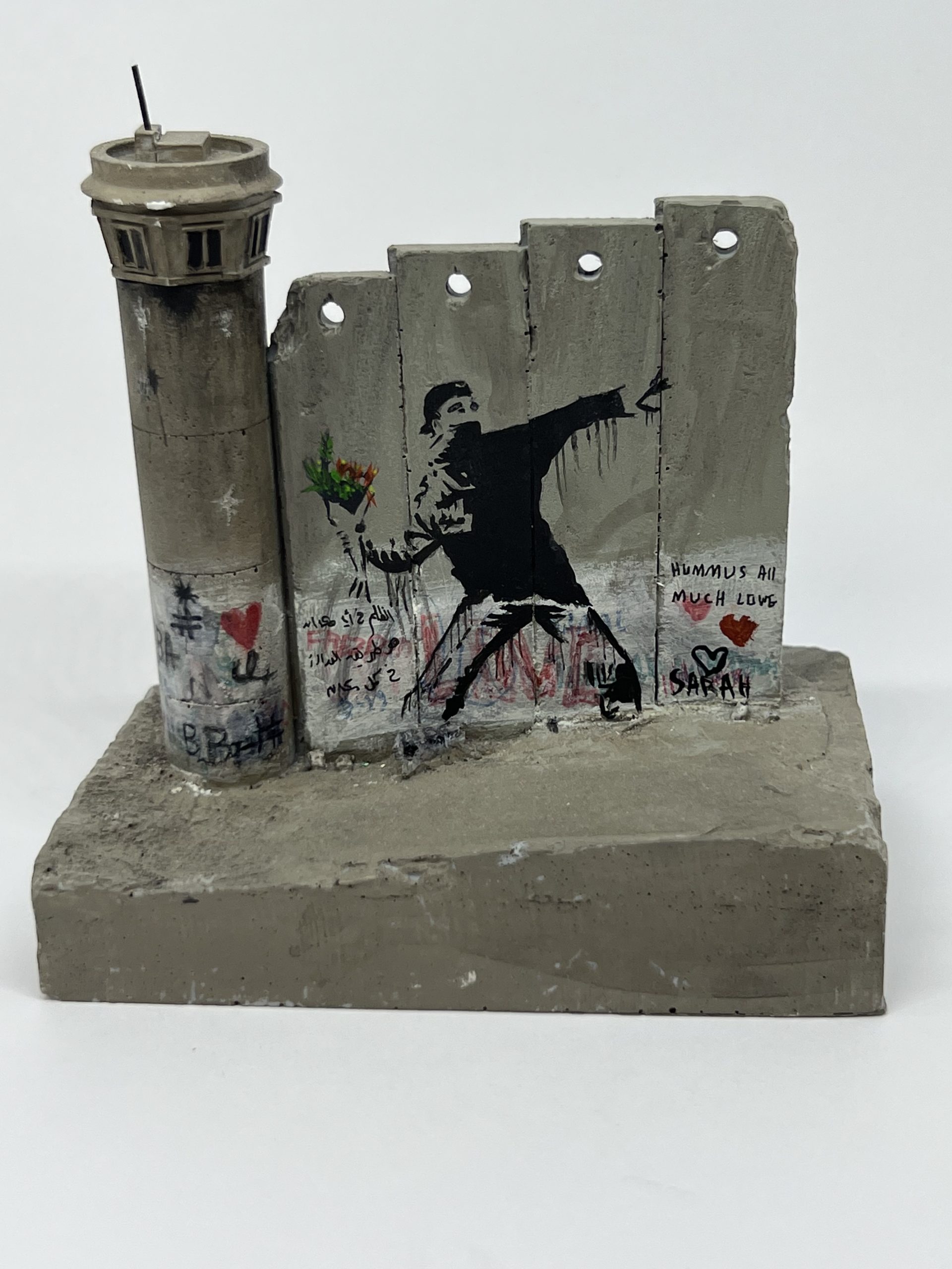 Banksy Flower thrower tower sculpture